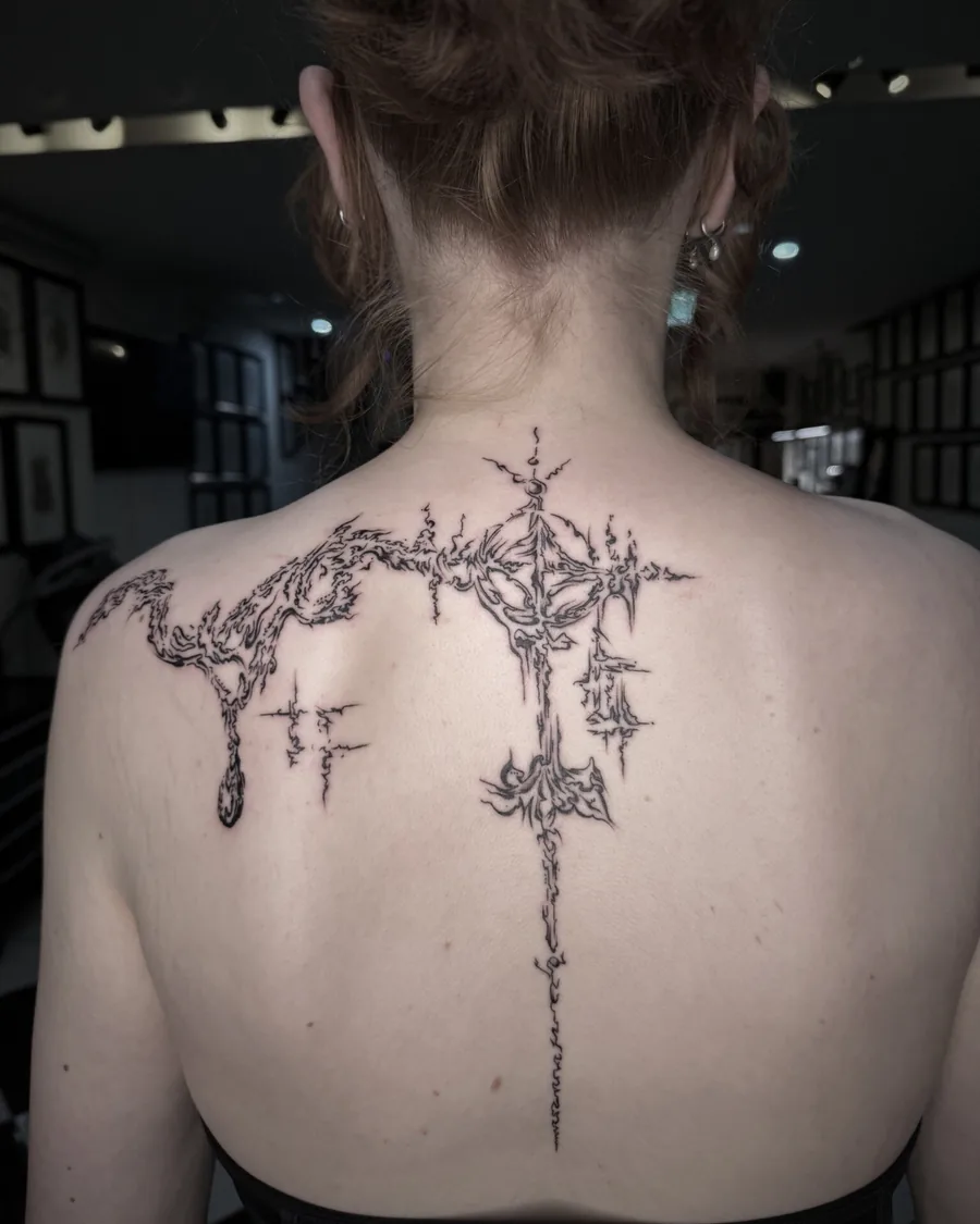 Fine line back tattoo
