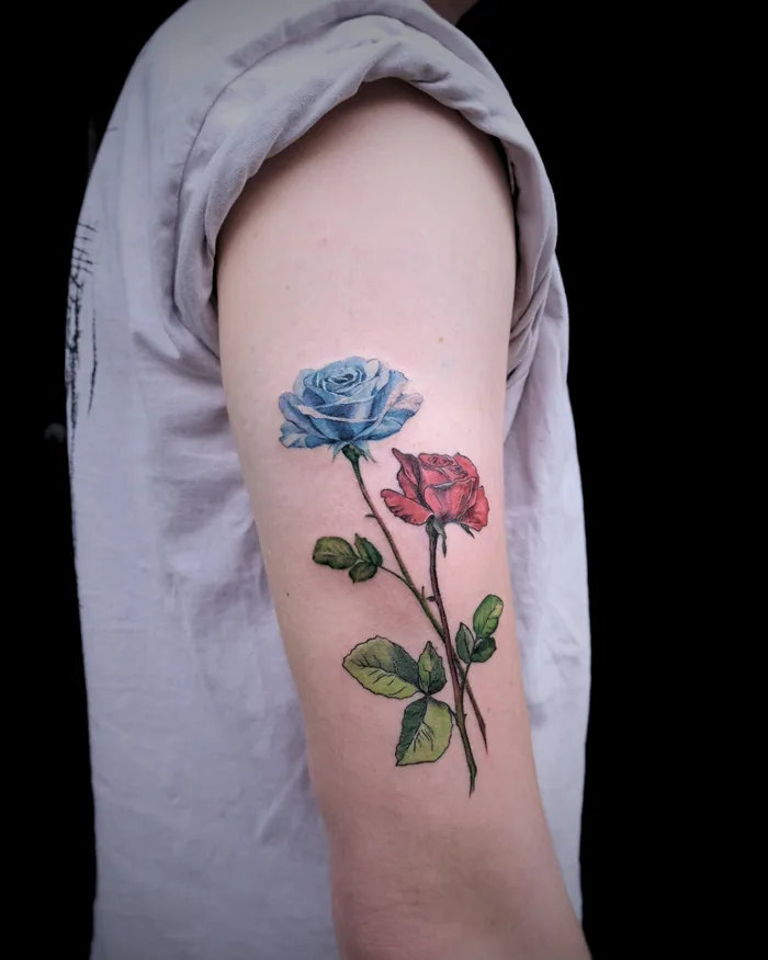 Blue and red roses tattoo